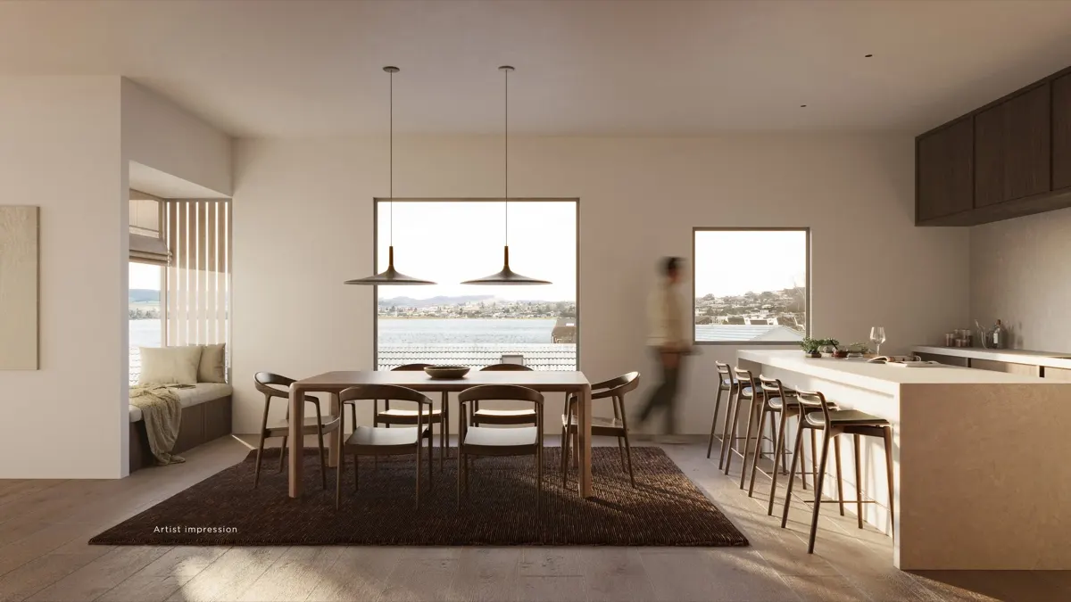 Dining and kitchen in the light oak palette, lake beyond